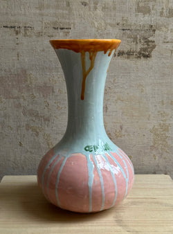 Elongated vase with colored drippings
